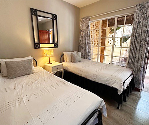 Sharing-en-suite-room-2-beds.jpg